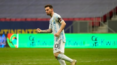 Lionel Messi celebrates scoring his penalty against Colombia during the shootout.