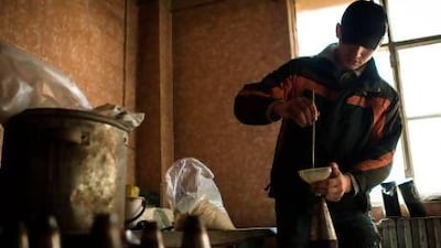 A young man makes missiles in a factory in northeastern Syria. About 100 people are killed daily in the uprising against president Bashar al Assad.