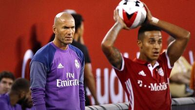 Real Madrid manager Zidane Zinedine (L) watches the second half of the International Champions Cup match between FC Bayern Munich and Real Madrid at MetLife Stadium in East Rutherford, New Jersey, USA, 03 August 2016. Justin Lane / EPA