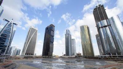 Dubai, 3rd March 2010. The Jumeirah Lake Towers buildings with the man made lake under construction. Jumeirah Business Centre 5 is the third tower from the left (black). (Jeffrey E Biteng / The National)