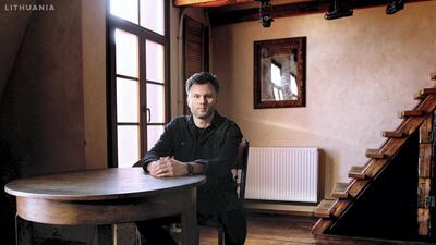 Povilas only visits an ATM once a month.