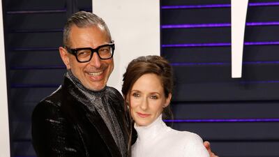 Jeff Goldblum in Givenchy and Emilie Livingston arrive at the 2019 Vanity Fair Oscar Party. Reuters