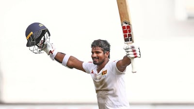Sri Lanka's Kusal Perera celebrates the victory after hitting the winning runs during the fourth day of the first Test against South Africa at Kingsmead in Durban. AFP