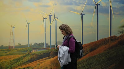 A mural at a Cop29 summit pavilion shows wind turbines, in Baku, Azerbaijan. Countries around the world have increased investments in renewables. Getty Images