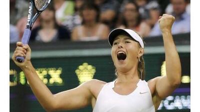 Russia's Maria Sharapova celebrates defeating Slovakia's Dominika Cibulkova.