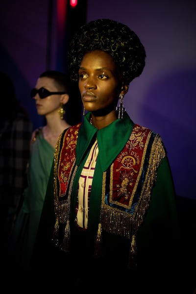 Centuries-old ecclesiastical embroidery is given a 1970s twist with the addition of a satin shirt