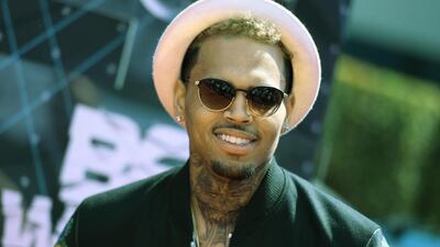 Chris Brown and his promoter were prevented from leaving Manila pending the immigration bureau’s clearance. Richard Shotwell / Invision / AP File