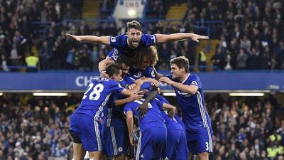 Chelsea’s N’Golo Kante is mobbed after scoring the fourth goal. Facundo Arrizabalaga / EPA