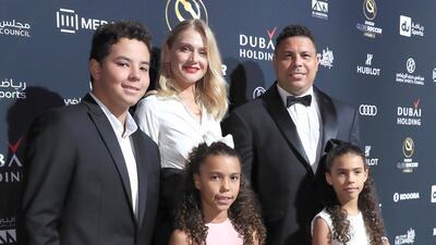 Ronaldo with his family at the red carpet during the Global Soccer Awards at the Madinat Jumeirah in Dubai on Thursday. Victor Besa / The National