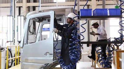 A technician works on a BharatBenz truck inside Daimler's Oragadam factory in Tamil Nadu. Babu / Reuters