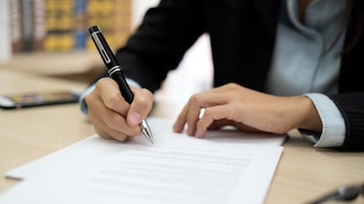 Employment terms can be amended by mutual agreement and a signature is deemed as acceptance by the employee. Getty