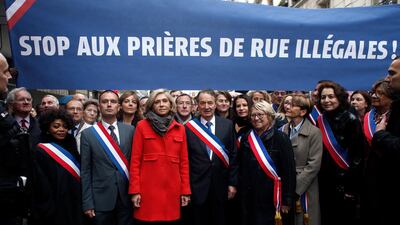 Demonstrations in a Paris suburb in November last year to prevent Muslims from praying in the street. Thibault Camus / AP