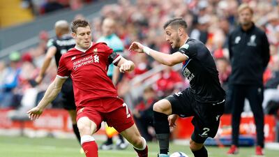 RM James Milner Made his Premier League debut at 16, and after more than 60 England caps, the Liverpool player quit the national team aged 30 last year. No going back, it seems. Martin Rickett / PA
