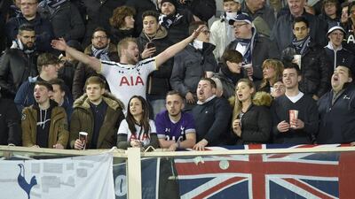 Tottenham supporters cheer before the Europa League football match Fiorentina vs Tottenham on February 18, 2016 in Florence. AFP PHOTO / ANDREAS SOLARO