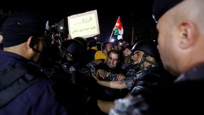 Jordanian demonstrators take part in a protest against tax hikes in Amman on November 30, 2018. Reuters