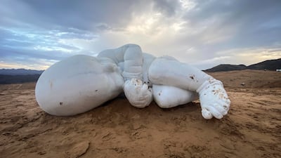 In late 2021, a marble sculpture of a child in fetal position showed up in the Fujairah desert. It is by Italian artist Jago, who first installed the work in Naples in 2020. All photos: Antonie Robertson / The National