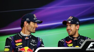 Sebastian Vettel, right, of Germany and Red Bull Racing team mate Mark Webber of Australia during a press conference after the Japanese Formula One Grand Prix at Suzuka Circuit in October. Mark Thompson / Getty Images