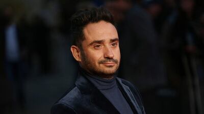 Director J A Bayona poses for photographers upon arrival at the premiere of the film A Monster Calls during the London Film Festival. Joel Ryan / Invision / AP