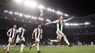 Juventus' Cristiano Ronaldo celebrates making it 3-0 during a UEFA Champions League match in Turin, Italy. AFP