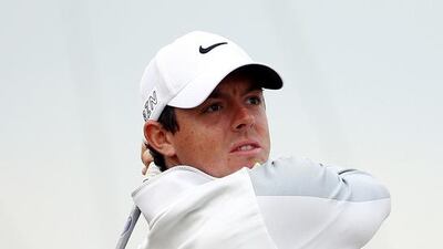 Rory McIlroy watches a tee shot during the first round. Mike Ehrmann / Getty Images / June 18, 2015