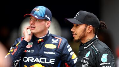 Mercedes' Lewis Hamilton with Red Bull's Max Verstappen. Reuters