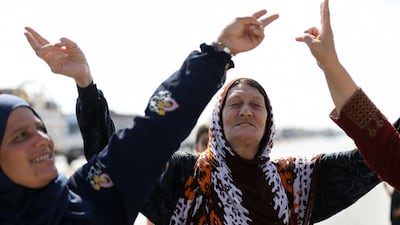 The convoy passes by to a public ovation. Reuters