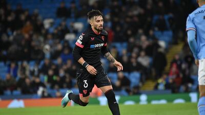 Alex Telles earns £70,000 a week at Sevilla. AP