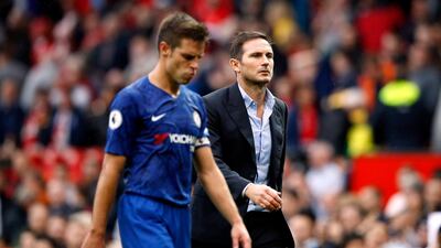 Lampard walks down the touchline post-match. PA