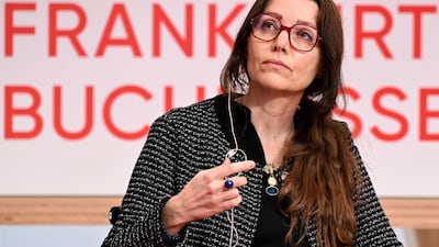 Turkish author Elif Shafak at the opening press conference of the Frankfurt International Book Fair. She says writers can 'keep the flame of peace and human dignity alive'. AFP