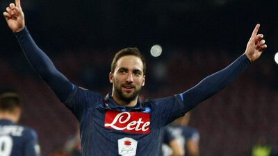 Napoli's Gonzalo Higuain celebrates after scoring on Monday in his side's 2-1 Serie A win over Genoa. Carlo Hermann / AFP / January 26, 2015