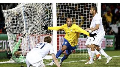 Brazil's Luis Fabiano wheels away after scoring the equaliser against the US during the Confederations Cup final at Ellis Park in Johannesburg. The Brazilians came from two goals down to win 3-2.