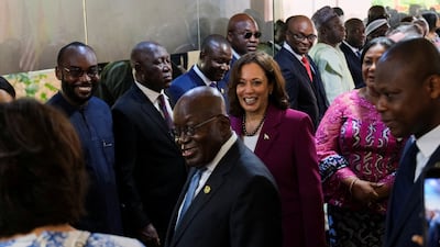 Mr Akufo-Addo introduces Ms Harris to some of the country's ministers upon her arrival. Reuters