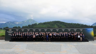 World leaders pose for a family photo at the summit's opening ceremony. Reuters