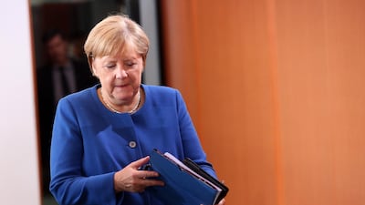 Angela Merkel arrives to discuss the federal budget with her cabinet. Getty