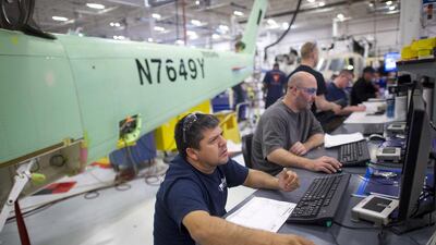 Aircraft technicians tests software for an S-76D helicopter on assembly at Sikorsky Global Helicopters in Coatesville, Pennsylvania. Mark Makela / Reuters