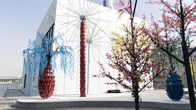 Even when the building is not open, you can wander up to the garden, where an extraordinarily beautiful – talk about pop of colour – installation of fantastical lighted trees is visible along the creek; it’s an installation by Kuwait-based artists Alia Farid and Aseel AlYaqoub. Photo: Reem Mohammed / The National