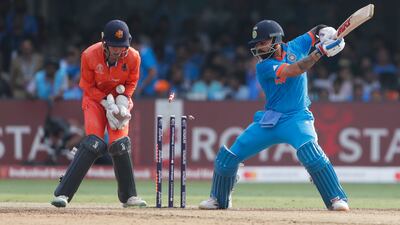 Virat Kohli of India is bowled by Roelof van der Merwe of Netherlands. Getty Images