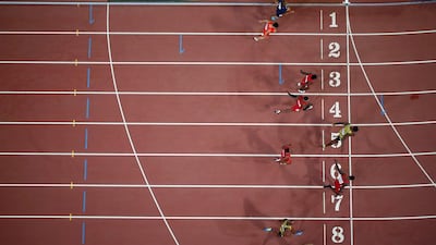 Usain Bolt in Lane 5 finishes just ahead of Justin Gatlin in Lane 7 on Sunday in the 100-metre final at the World Championships in Beijing. Ian Walton / Getty Images