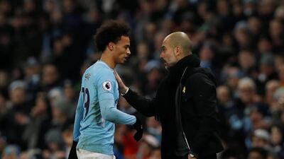 Pep Guardiola, right, is pleased with the form of Leroy Sane at Manchester City. Lee Smith / Action Images via Reuters