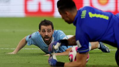 Manchester City's Bernardo Silva has his chance saved by Fluminense's Fabio. Reuters