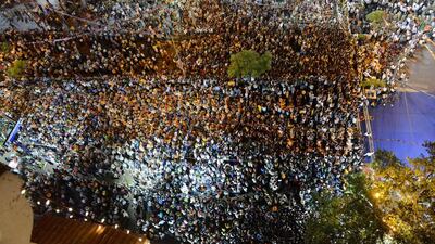 Indian Bharatiya Janata Party (BJP) supporters in large numbers attend a rally by Chief Minister of western Gujarat state and BJP prime ministerial candidate Narendra Modi in Ahmedabad. Sam Panthaky / AFP Photo