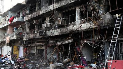 A view of damaged buildings after a car bomb attack at Sinaa street in central Baghdad, Iraq which killed at least 22 people and wounded dozens. Ali Abbas/EPA