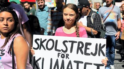 Teen activist Greta Thunberg walks during the Global Climate Strike march on September 20, 2019 in New York City. AFP