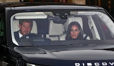 Prince Harry and Meghan Markle arrive for the Queen's Christmas lunch at Buckingham Palace, London, Wednesday Dec. 20, 2017. Jonathan Brady/PA via AP