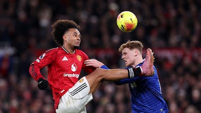 Joshua Zirkzee of Manchester United challenges for an aerial ball with Jake O'Brien of Everton. Getty Images