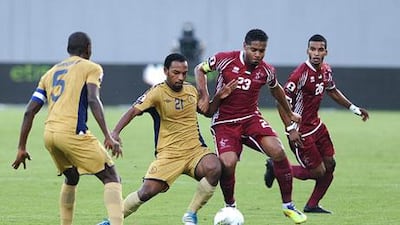 Al Wahda’s Mahmoud Khamis, far right, scored a brilliant goal in the 68th minute to take the game away from Dubai on Sunday night.