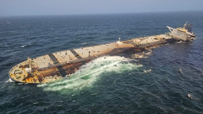 The damaged and half sunk oil tanker Caroline Bezengi, off the coast of Oman. Reuters