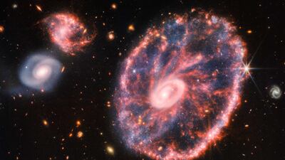 A composite image of the Cartwheel Galaxy captured by the James Webb Space Telescope in August 2022. AFP