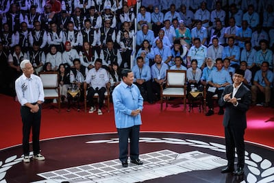 Indonesian presidential candidates, from left, Ganjar Pranowo, Prabowo Subianto and Anies Baswedan, at the first election debate in Jakarta in December. AFP