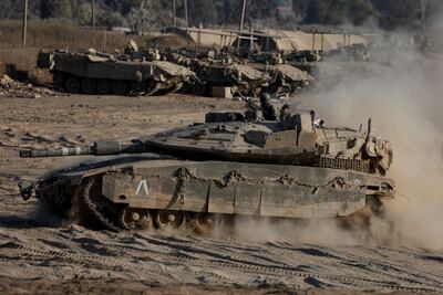 An Israeli tank manouvers near the Israel-Gaza border. Reuters